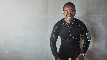 Image showing Man, portrait and music for fitness outdoor with listening, podcast or exercise for healthy body with mockup. Athlete, african person or earphones with arm pouch for phone, radio or happy for workout