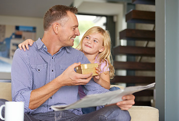Image showing Surprise, father and child with present in home for birthday or giving a box for special event. Family, gift and offer dad a gold package to show gratitude, care or kid with kindness in living room