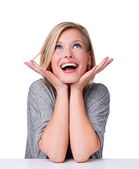 Image showing Woman, surprised and happy in studio for deals, discount announcement and wow customer expression for sale. Notification, omg for good news and smile model on white background with mockup space