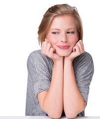 Image showing Woman, smile and studio with hands, thinking or daydreaming or planning. Model, nostalgia or ideas with contemplating, wondering or playful or thoughtful and sitting isolated on white background