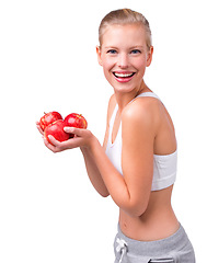 Image showing Apple, nutrition and happy portrait of woman with benefits in diet on white background in studio. Girl, smile and eating fruit for detox of digestion and food with vitamin C and fiber for gut health