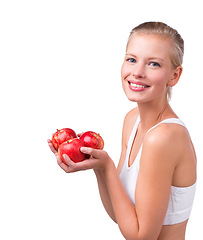 Image showing Happy, woman and portrait with apple for nutrition benefits in diet on white background in studio. Girl, smile and eating fruit for detox of digestion and food with vitamin C and fiber for gut health