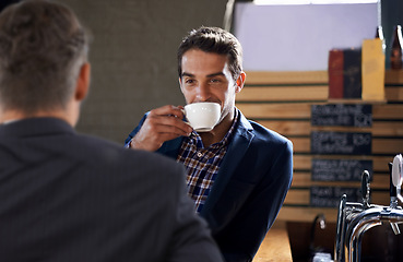 Image showing People, drink and coffee in pub for business meeting, appointment or consultation in Dublin. Businessmen, smile and hot beverage for discussion, team building or conversation after work at restaurant