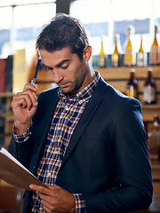 Image showing Restaurant, thinking or man with stock, checklist for small business logistics, inventory or menu on clipboard. Startup, pub ideas or manager with sale price for retail order in diner cafe or bar