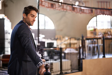 Image showing Businessman, break or thinking in cafe to relax for daydreaming of opportunity and ideas. Entrepreneur, customer or confident person in coffee shop with vision in pub, restaurant or bar by railing