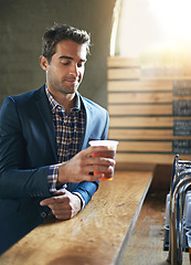 Image showing Thinking, restaurant or businessman at pub with beer or beverage to relax at social time or event. Hospitality industry, entrepreneur or male customer at diner or bar and enjoying alcohol cider drink