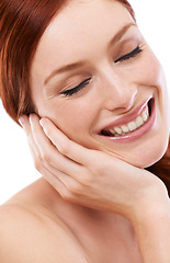 Image showing Skincare, smile and face of woman in studio with makeup, natural beauty and cosmetics on white background. Happy, dermatology and hand with shine for self care, glowing and wellness with eyes closed