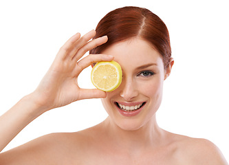 Image showing Woman, smile and lemon for skincare in studio with beauty, glow or hydration benefit on white background. Portrait, cosmetic and face with citrus fruit for vitamin c, dermatology and self care