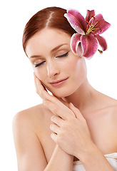 Image showing Cosmetic, flower and woman in studio with natural, organic and beauty face routine for wellness. Skincare, glow and person with floral plant for facial dermatology treatment by white background.