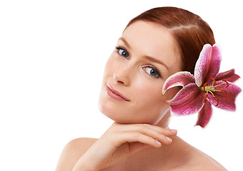 Image showing Cosmetic, flower and portrait of woman in studio with natural, organic and beauty routine for health. Skincare, mockup and model with floral plant for facial dermatology treatment by white background