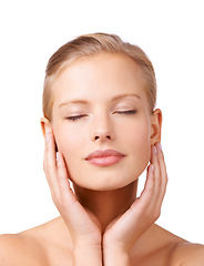 Image showing Calm woman, relax and skincare with facial treatment for beauty, cosmetics or makeup on a white studio background. Face of young female person or model in satisfaction for soft skin or wellness