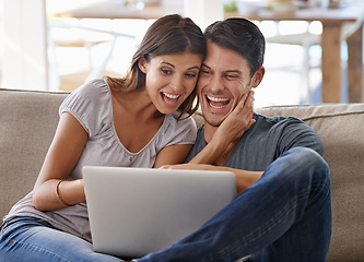 Image showing Happy couple, laptop and sofa with good news for winning, giveaway or surprise in living room at home. Excited man and woman with smile on computer in celebration for promo, deal or discount at house