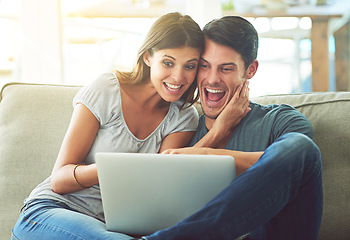 Image showing Excited couple, laptop and sofa with hug for good news, winning or giveaway in living room at home. Happy man and woman with smile on computer in celebration for promotion, deal or discount at house