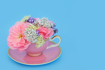 Image showing Surreal Flower and Herb Tea Cup Arrangement 