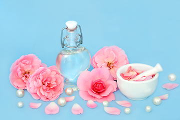 Image showing Rose Flower Perfume Preparation with Pearls and Flowers