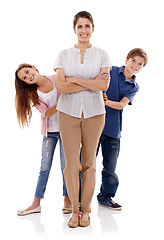 Image showing Happy mother, portrait and children with family for support, love or bonding on a white studio background. Mom and kids with smile in confidence for protection, trust or parenting in care or safety
