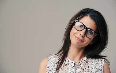 Image showing Glasses, fashion and portrait of woman on gray background for vision, eyesight and optometry. Optician, mockup space and face of isolated person with spectacles, prescription lens and frame in studio