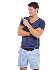 Image showing Man, smile and pointing finger for fashion sale, discount or promotion on mockup on white background. Happy male person, tshirt and shorts for casual, fashionable and summer clothing in Greece