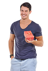 Image showing Happy man, present and studio portrait with smile, casual and gift on isolated white background. Confident, attractive and male model with box, anniversary and celebration surprise on backdrop