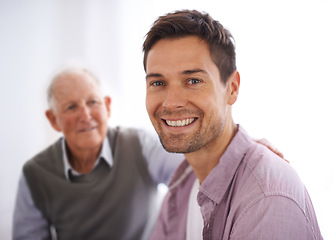 Image showing Father, adult son and portrait with love and bonding at home, respect and care with trust in healthy relationship. Happiness, support and men with time together for pride and loyalty with family