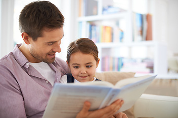 Image showing Father, child and reading book for storytelling, happy and bonding at home and knowledge or education. Man, young girl and story time for family and learning with love and care together in lounge