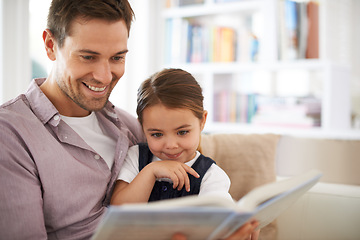 Image showing Dad, kid with book for reading and storytelling, happy with bonding at home and knowledge for education. Man, young girl and story time for family and learning with love and care together in lounge