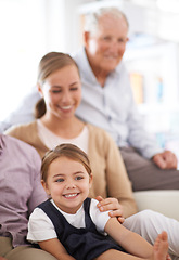 Image showing Girl, child and family with happiness on sofa for healthy development, security or comfort in apartment. Face, mother and grandfather with kid, smile and bonding for parenting and love in house