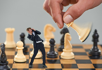 Image showing Man, business and chess with strategy, risk and fear for career safety or attack. Worker, scared and corporate with competition, debt and shouting from terror with pawn overwhelmed with job security