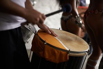 Image showing Drummer, hands and music with percussion drums on stage, rhythm and person with talent in band. Creative people, beat and performing in group as professional musician and energy for entertainment