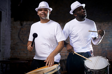 Image showing Portrait, drums and band at music performance for culture, heritage or tradition in Rio de Janeiro. Art, creative and samba with drummer black men playing instrument outdoor for street carnival