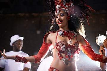 Image showing Black woman, samba performance with band at night for carnival season celebration in Rio de janeiro with sequins costumes. Female person, happy and dancing at festival with unique fashion for culture