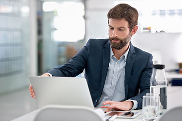 Image showing Laptop, reading and businessman in office for research on company finance or budget project. Technology, career and male financial advisor working with computer on corporate account in workplace.