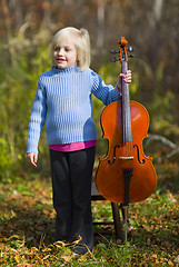 Image showing Child Standing With Cello