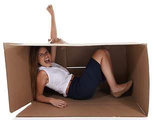 Image showing Portrait, winner and woman breaking box in studio isolated on white background for delivery success. Goals, target and victory with fist of excited young person cheering or shouting for distribution