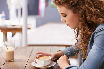 Image showing Woman, thinking and coffee at outdoor cafe, latte and relax with day dream and idea for job. Female person, bistro and holding cup with cappuccino, peace and contemplate at breakfast or lunch