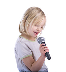 Image showing Child Singing Into Microphone