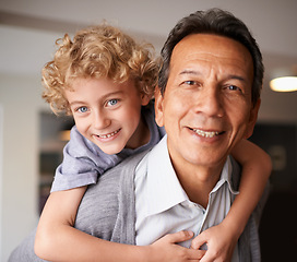 Image showing Portrait, senior citizen and boy with smile, piggyback and bonding together in multiracial family. Happy, retired male person or young kid for sweet, hug and embrace with love, cheer and care at home