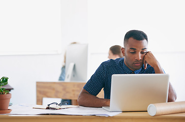 Image showing African, businessman and laptop with office, bored and tired with work. Architect, technology and paperwork with computer, fatigue and startup or small business with plans for entrepreneurship