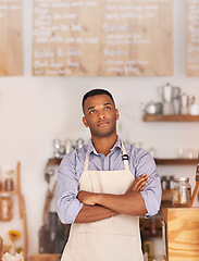 Image showing Owner, black man and thinking of cafe for business as entrepreneur, professional and working as barista. Male person, standing and thoughtful of idea for startup of store for coffee in Cape Town