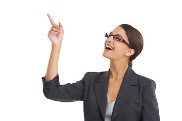 Image showing Pointing, happy and business woman on a white background for news, information and announcement. Professional, corporate worker and isolated person with mockup space for company promotion in studio