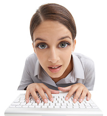 Image showing Portrait, business and woman with keyboard, typing and professional isolated on a white studio background. Face, person and employee with thinking and consultant with deadline, worker and schedule