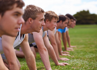 Image showing Group, men and field for push up with fitness, training and health with friends for sport, challenge or wellness. People, athlete and teamwork with exercise, workout and together on field for muscle