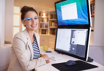 Image showing Portrait, happy woman and smart glasses for business by computer at table in home office. Face, professional and creative graphic designer on desktop with future tech for remote work in Australia