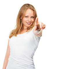 Image showing Smile, portrait and woman with hand pointing at you in studio for news, deal or info on white background. Face, happy or female model show prize, vote or competition giveaway, promotion or offer