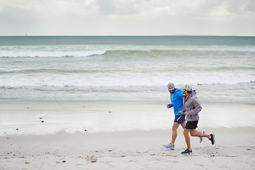 Image showing Seaside, men and running on beach, sand and fitness for wellness and gym wear on coast together. Male athletes, jog and training for ocean, health and outdoor for sport and exercise together