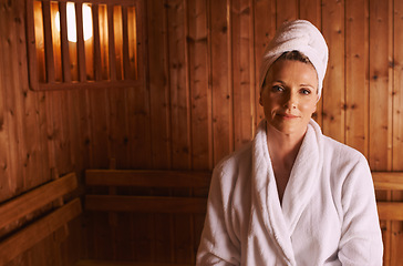 Image showing Woman, portrait and spa sauna in bathrobe for accommodation hospitality, treatment or stress relief. Female person, face and towel at Bali resort for holiday vacation with wellness, care or relax