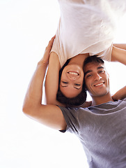 Image showing Couple, portrait and smile from low angle, outdoors and romance or bonding time. Happy man, loving woman and honeymoon or travel together in summer, nature and sky while affectionately embracing