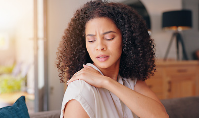 Image showing Woman, shoulder pain and injury in home with stress, thinking and hand for massage for relief. Girl, person and burnout with muscle, strain or arthritis with ideas, rub or sad in morning at apartment