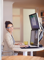 Image showing Portrait, business woman and smart glasses by computer at table in startup office. Smile, professional and creative graphic designer on desktop with future tech for entrepreneur working in Australia