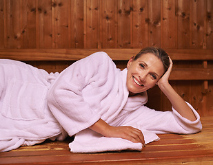 Image showing Woman, portrait and relax in sauna or treatment for spa vacation or wellness care for resting, detox or holiday. Female person, face and bathrobe or peace at Bali resort or rest, stress free or calm